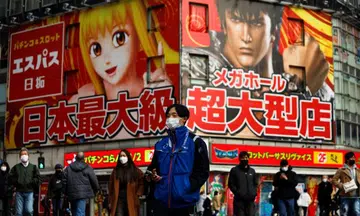 Curbs extended in Japan as Covid-19 surges; daily tally tops 40,000 for first time