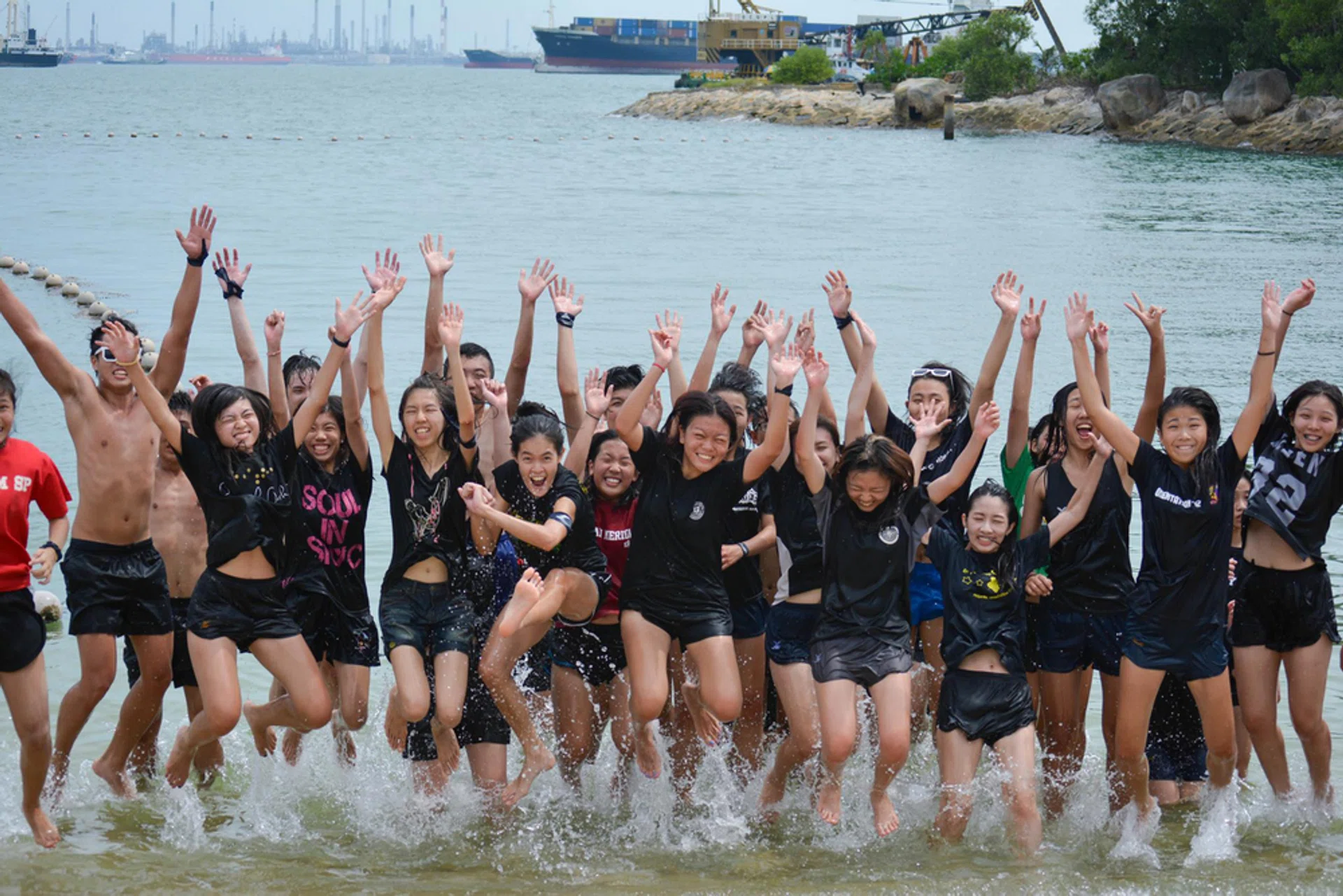 Undergraduates at Nanyang Technological University (NTU) enjoying themselves at a beach during an orientation programme. 