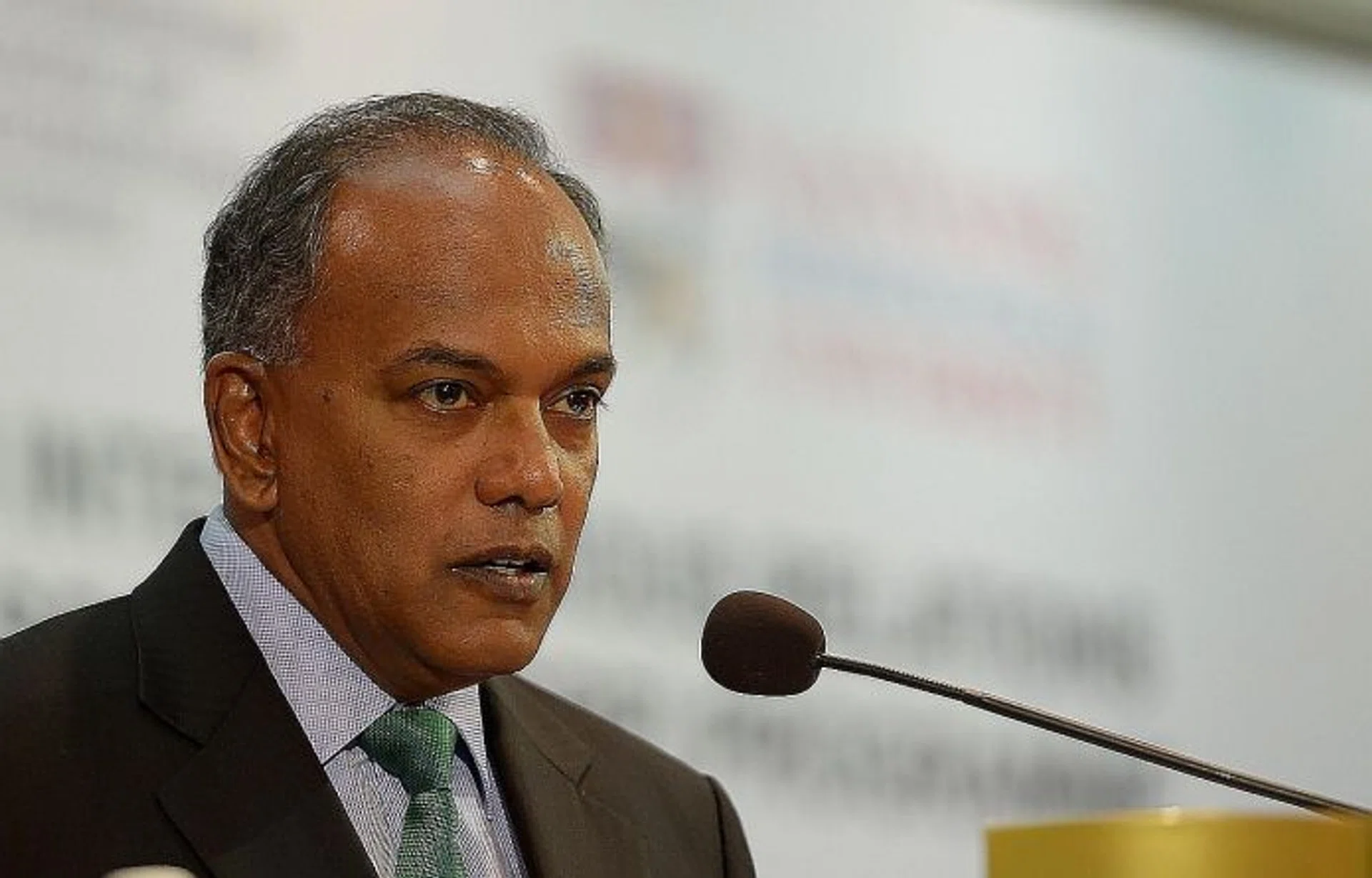 CAUTION:  Home Affairs and Law Minister K. Shanmugam