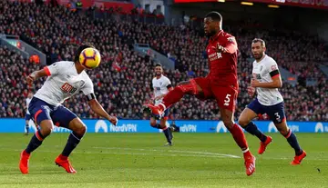 Wijnaldum returns from illness to help Liverpool go top