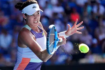 Muguruza battles past Halep to reach Australian Open final