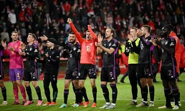Bayern thump Union Berlin as Mueller marks milestone with double