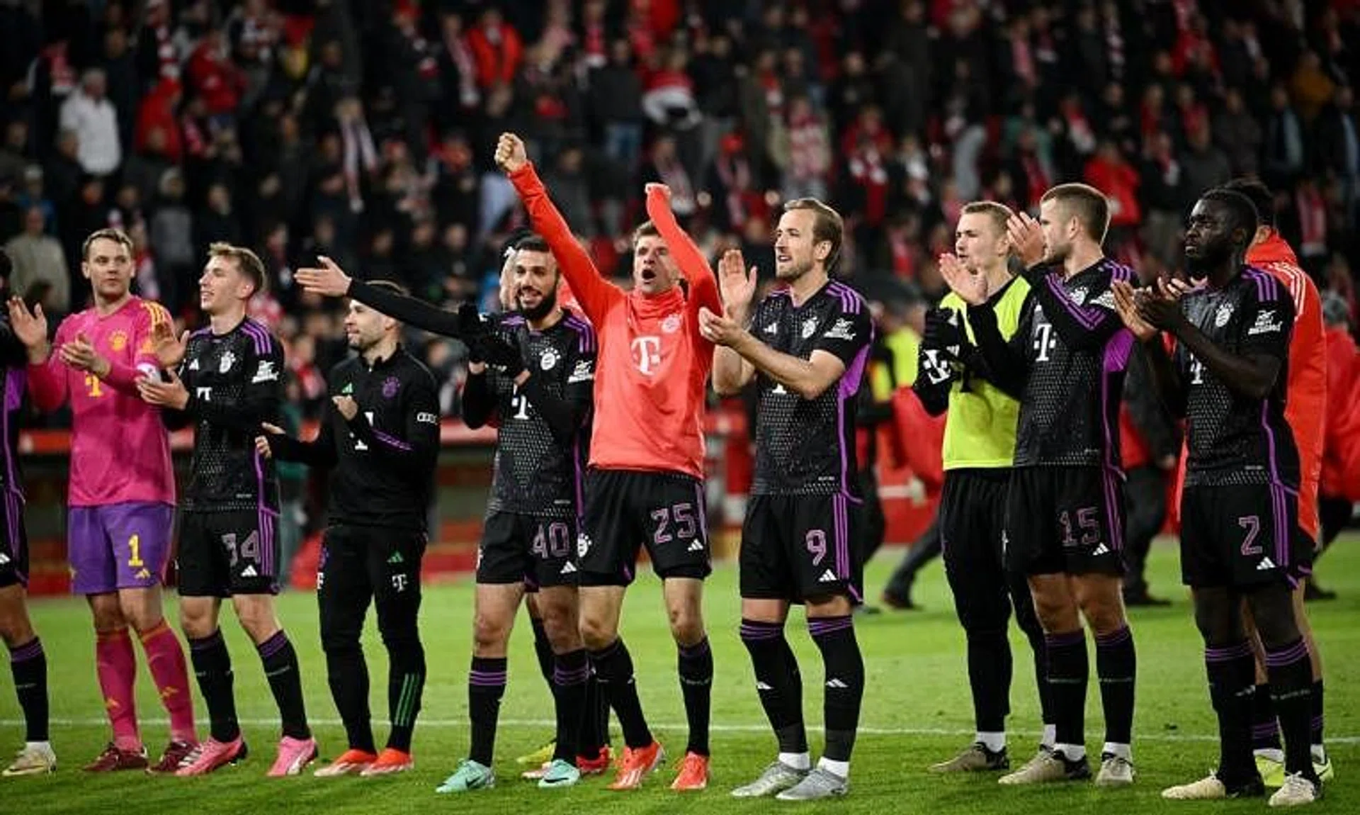 Soccer Football - Bundesliga - 1. FC Union Berlin v Bayern Munich - Stadion An der Alten Forsterei, Berlin, Germany - April 20, 2024 Bayern Munich's Thomas Mueller and Harry Kane celebrate after the match REUTERS/Annegret Hilse
