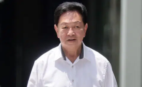 Undertaker Roland Tay to pay $12,000 fine, $529k penalty