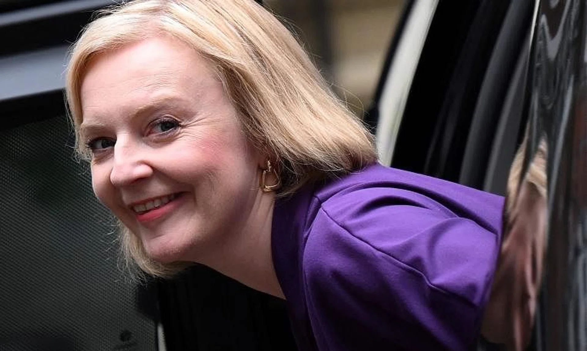 Britain's outgoing PM Liz Truss arriving at Conservative Party Headquarters in central London on Oct 19, 2022.