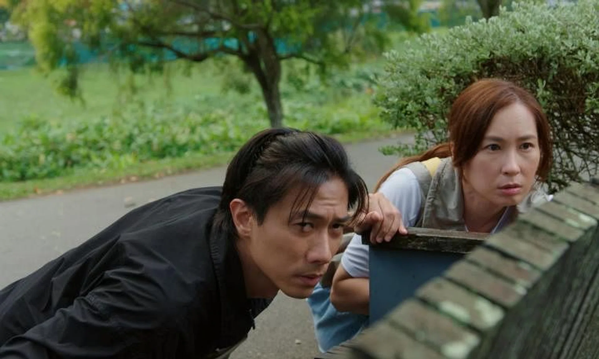 Desmond Tan (left) and Paige Chua in Moments, a Channel 8 series about two private investigators.