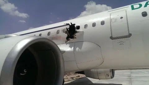 Man 'drops' from plane after explosion