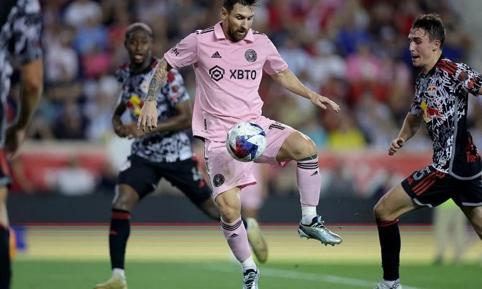 Inter Miami forward Lionel Messi (centre) against New York Red Bulls defender Andres Reyes during the Red Bull Arena on Aug 26. 
