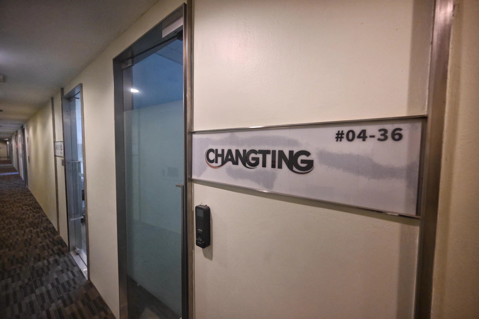 The exterior of Changting Network Technology's office at Paya Lebar Square. When The Straits Times visited on Sept 9, there was no one in. 