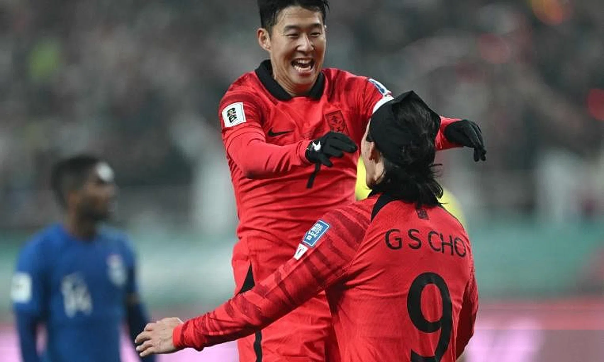 South Korea forward Cho Gue-sung (No. 9) celebrating his opening goal with captain Son Heung-min (top) during their 5-0 win over Singapore in a World Cup qualifiers in Seoul On Nov 16.