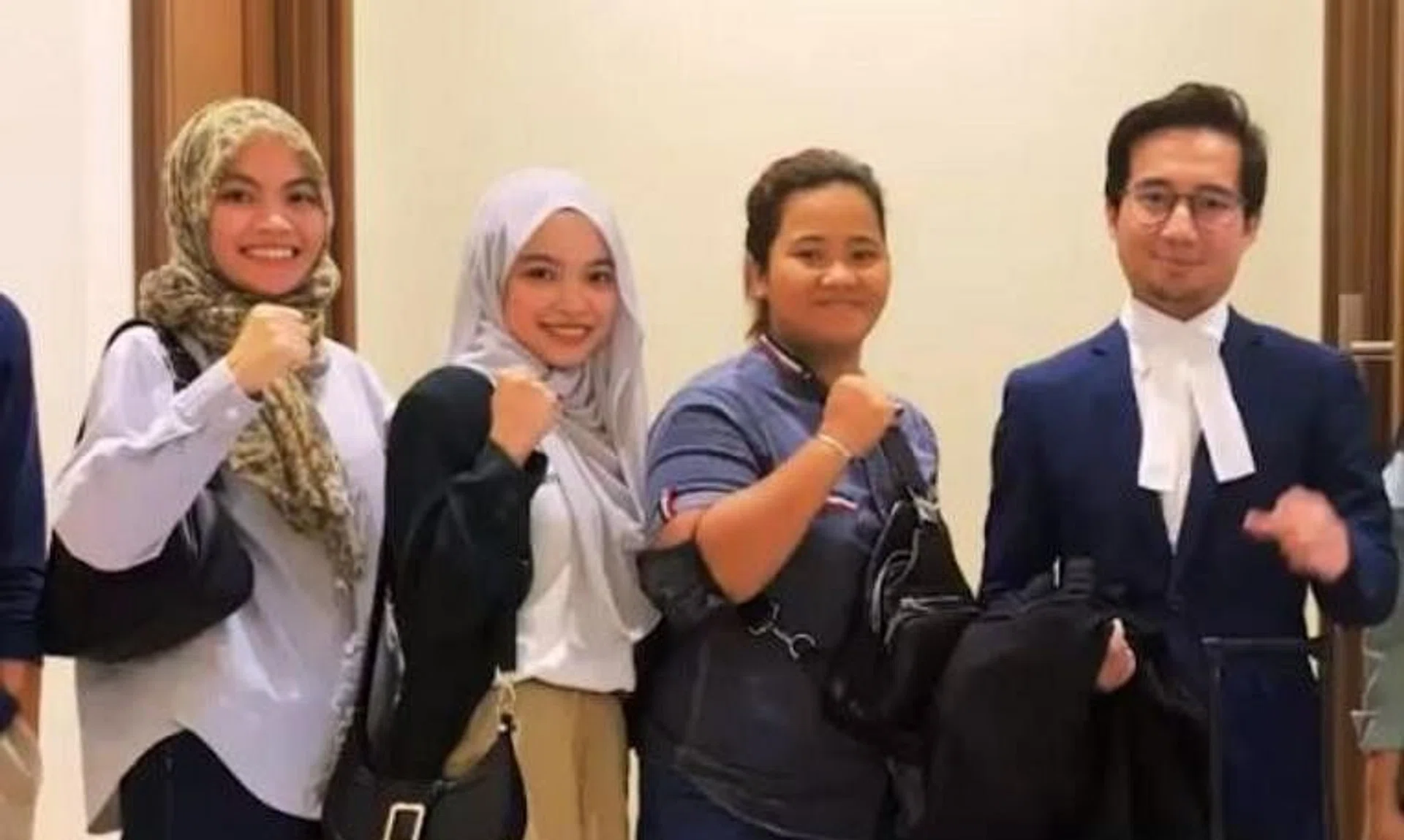(From left) Students Calvina Angayung, Nur Natasha Allisya Hamali, Rusiah Sabdarin and their lawyer Sherzali Herza Asli.