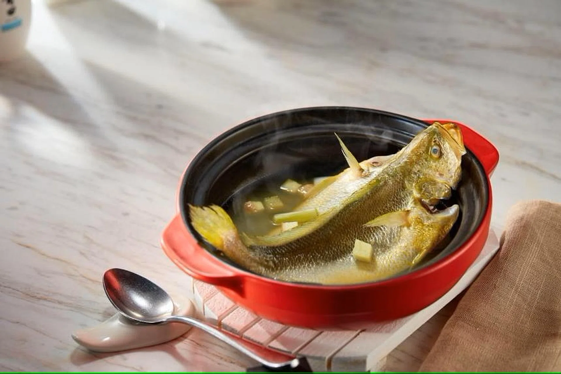 One of Putien's signature dishes is its stewed yellow croaker. 