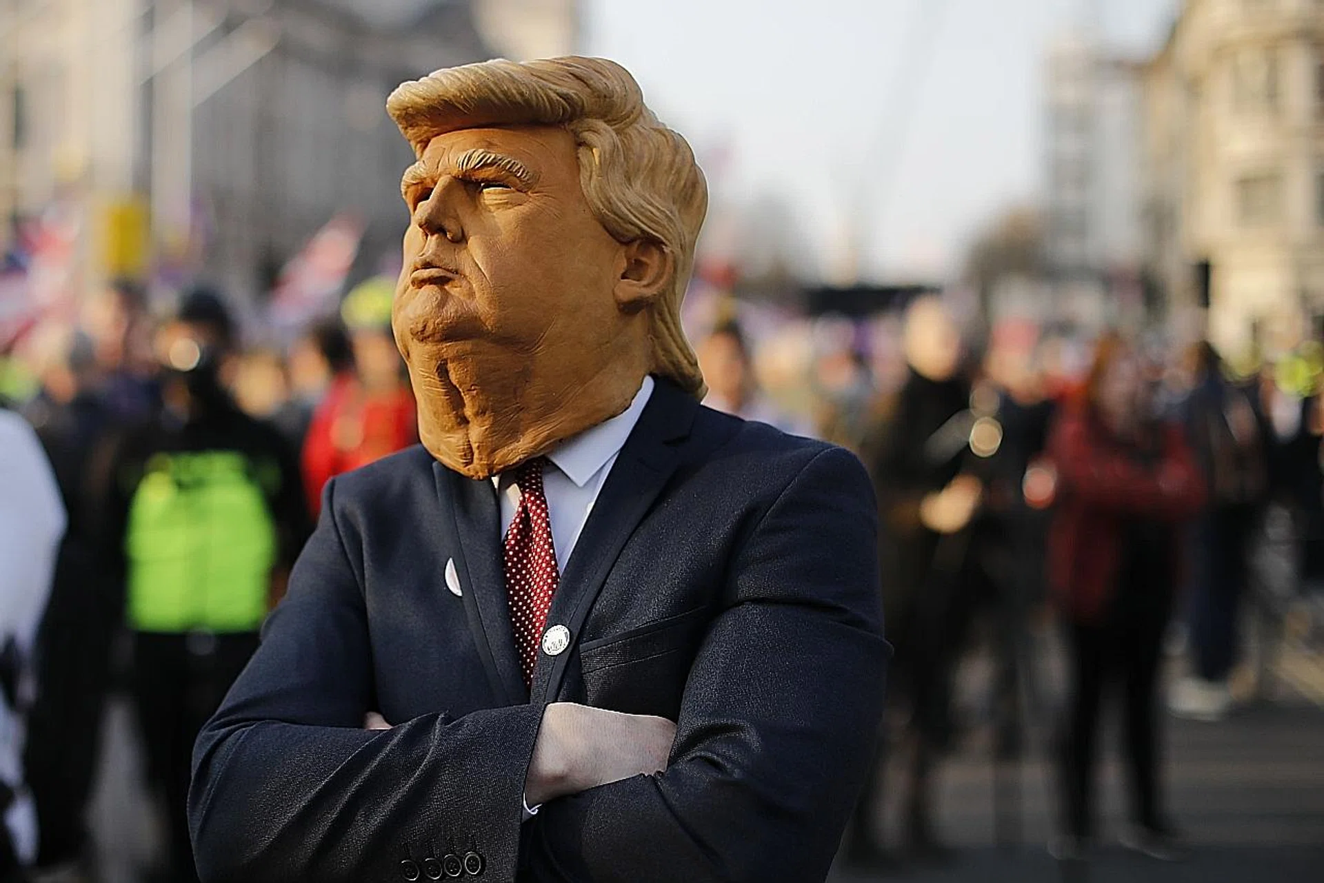 A protester in a Trump mask in central London. 