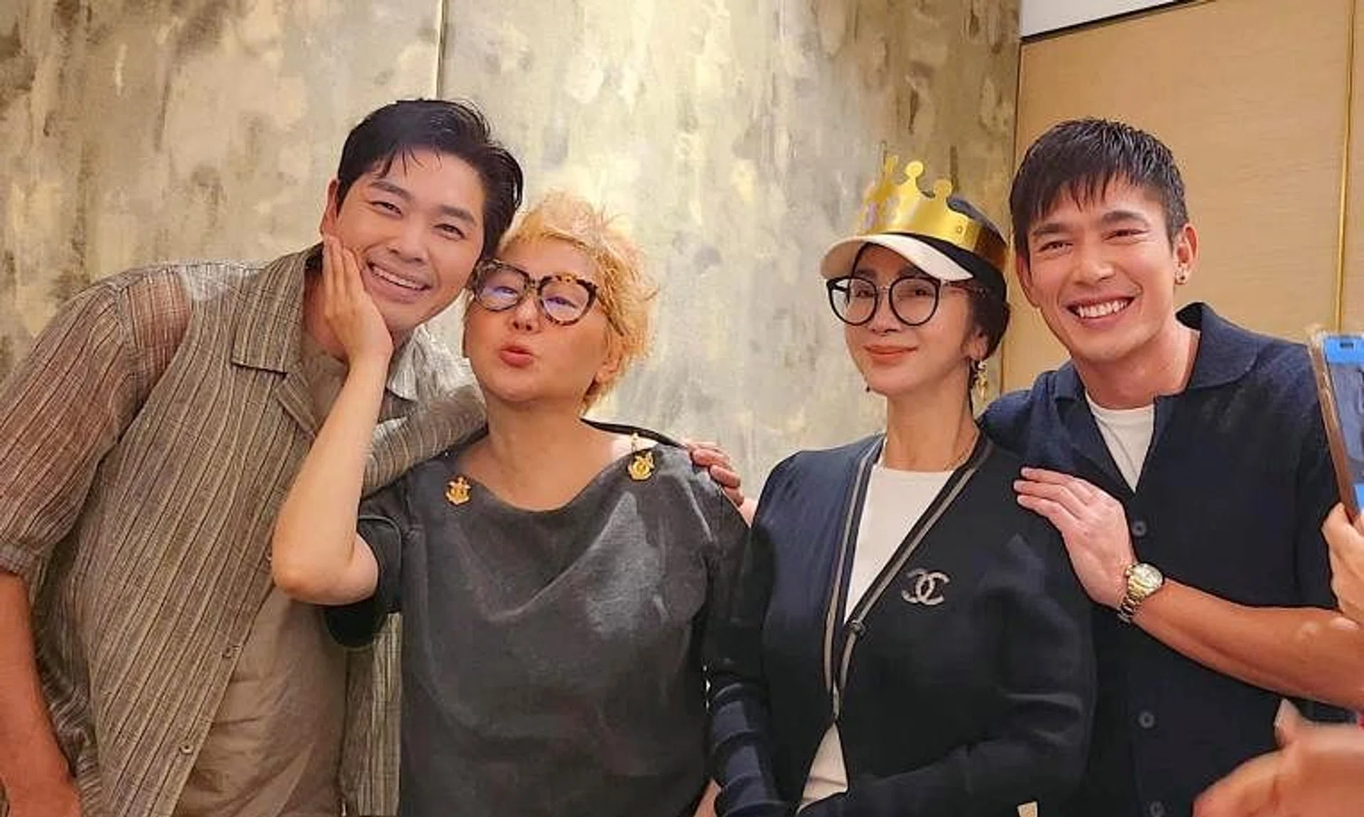 Taiwanese star Chen Mei-fen (second from right) celebrates her birthday with Singaporean actors Romeo Tan (far left) and Elvin Ng (far right) and Taiwanese host Pauline Lan (second from left) in Singapore.