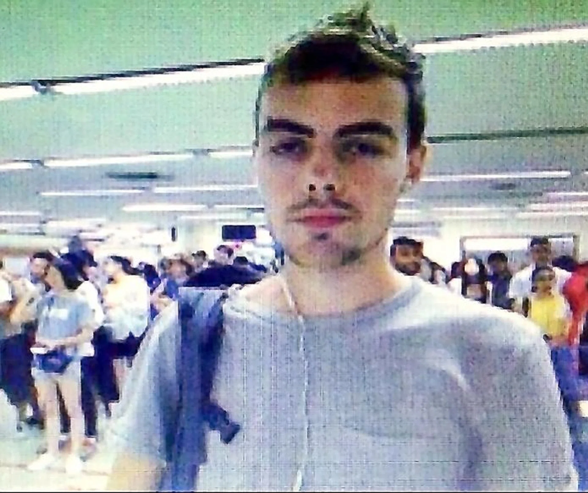 CAUGHT: Suspected bank robber Canadian national David James Roach (above) was arrested at a Bangkok hostel.