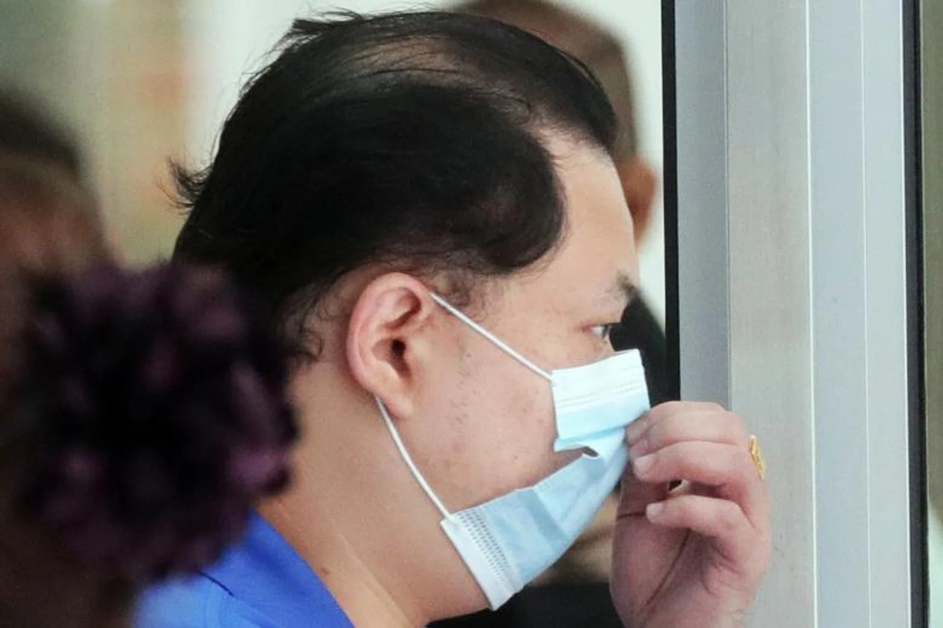 Ng Wee Siang redeemed the face masks on 14 occasions last year. 
