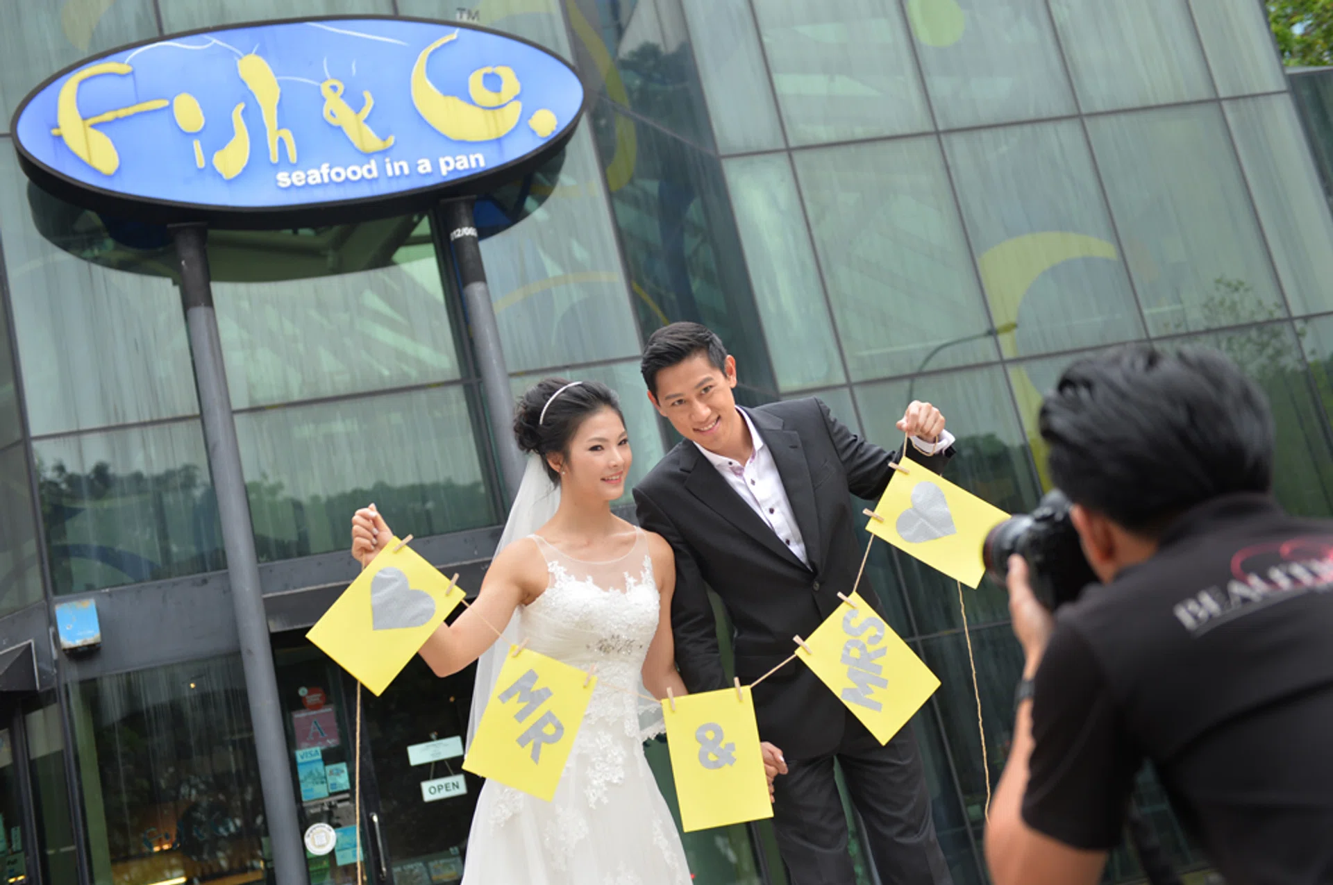 Mr Jonathan Ng and Ms C C Ouyang had one of their first few dates at Fish & Co's Glass House and he also proposed to her there.