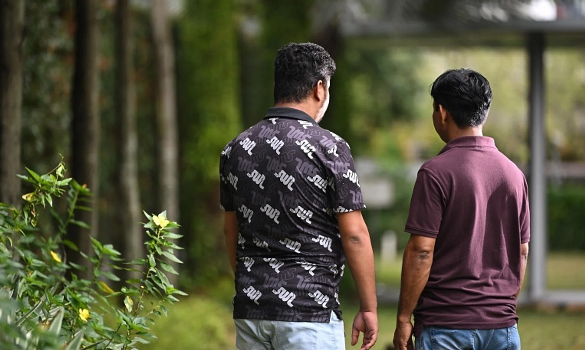 Mr Rahman Lutfor (left) gave manager Derrick Ho $6,000 over four years, while Mr Hanif Mohammed gave Ho $5,600 over four years.