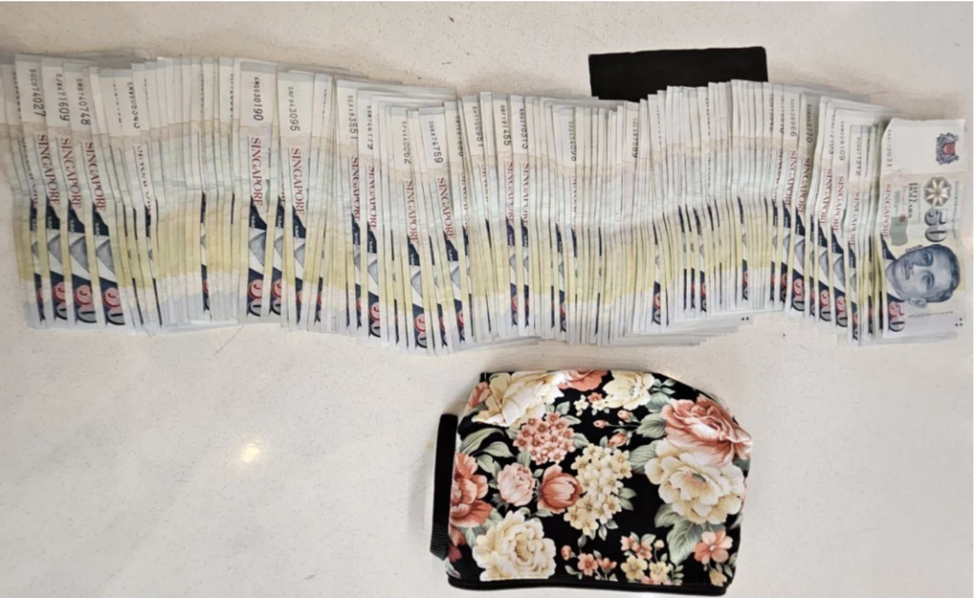 Cash seized at Eunos Crescent.