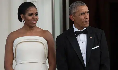 Barack and Michelle Obama return to the White House for portrait unveilings