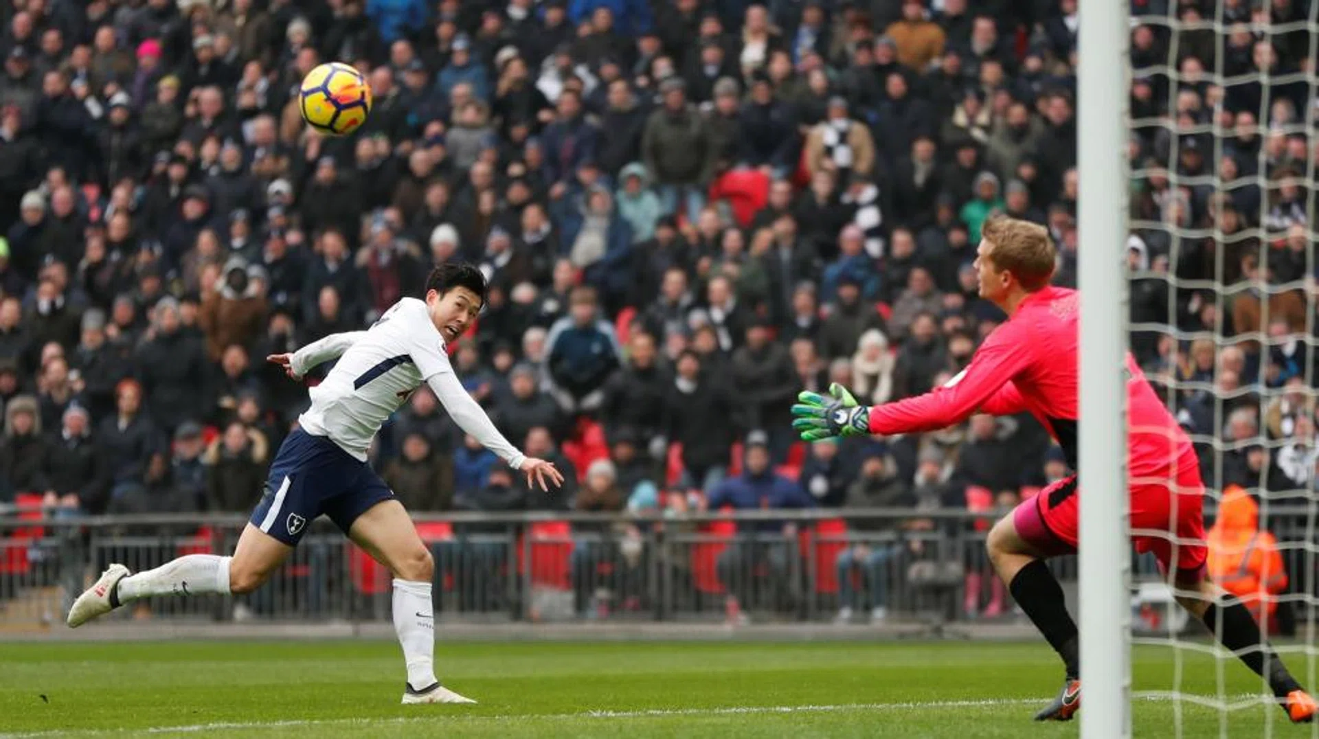 Tottenham's Son Heung Min scoring their second goal against Huddersfield.