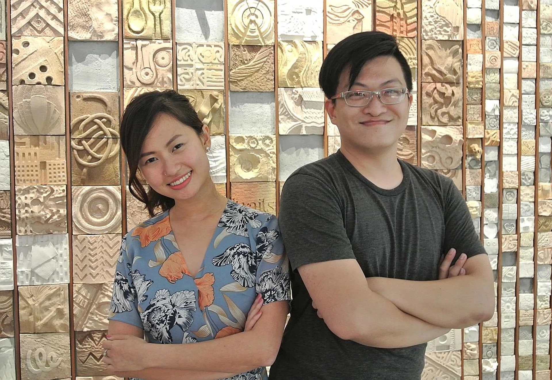 Miss Zelia Leong (above, left) and Mr Felix Tan want to share their passion for travelling with users of their travel booking service Anywhr.