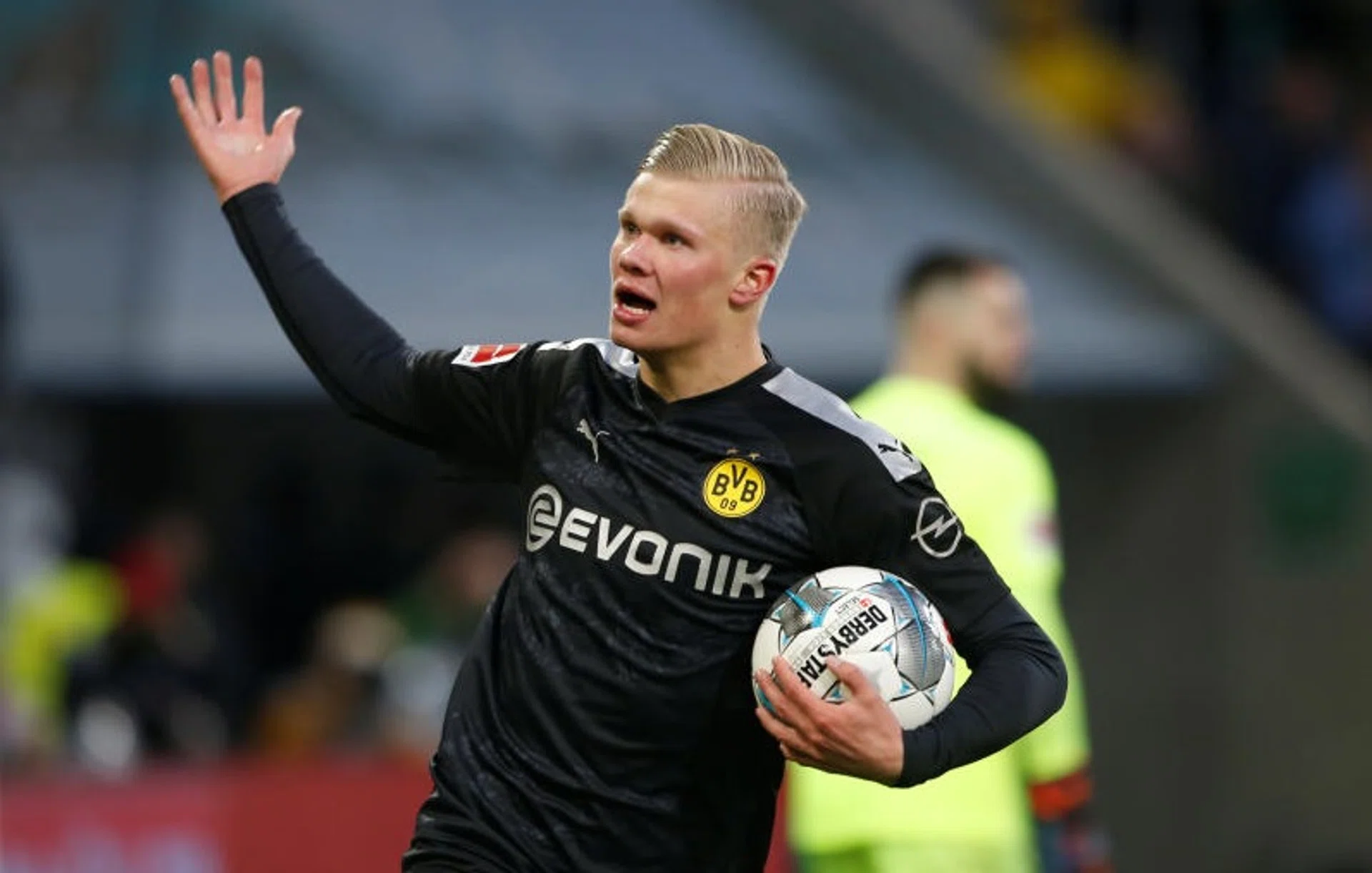 Erling Haaland celebrates after scoring his second goal.