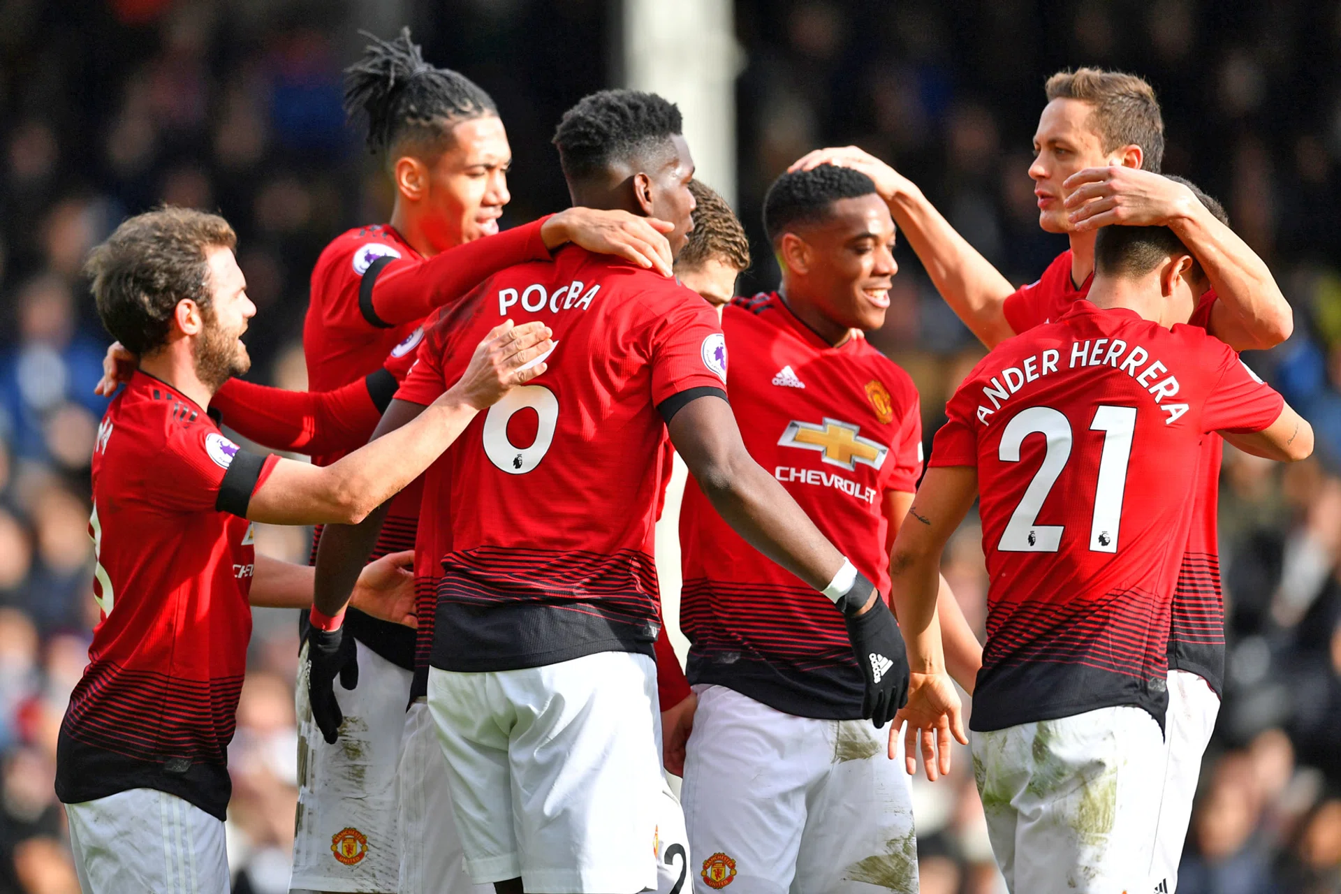 Diehard fan Khim Yap is excited about watching his beloved Manchester United (above) at the Sports Hub in July. 