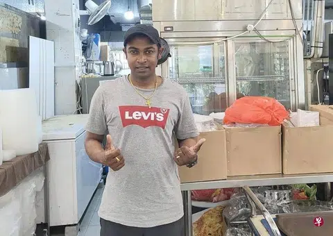 He was born Indian, but his language is Mandarin, and he is known for his zi char dishes