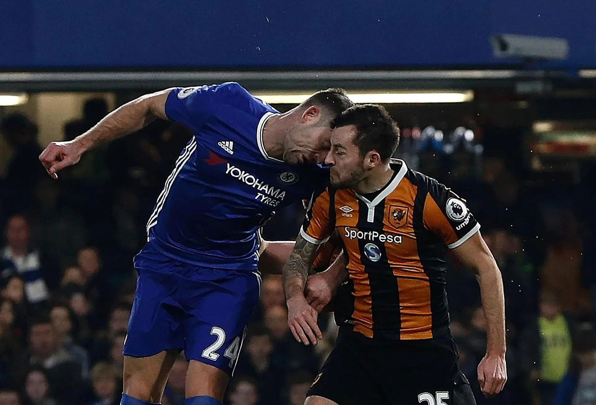 Hull midfielder Ryan Mason (right) in a clash of heads with Chelsea's Gary Cahill, which led to a skull fracture.