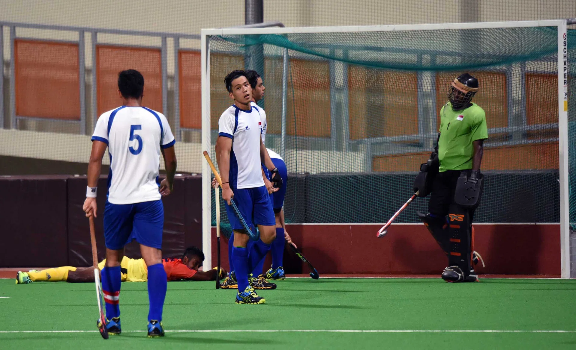 COLLAPSE: The Singapore backline are dejected after conceding Sri Lanka’s winning goal, scored by Abeetha Fernando.