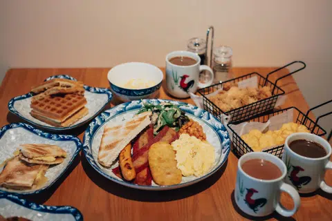 Tina's Cafe offers local staples such as kaya butter toast, nasi lemak and Tina's Breakfast Platter.