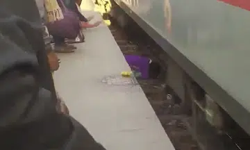 Indian woman saves her 2 kids as train went over them