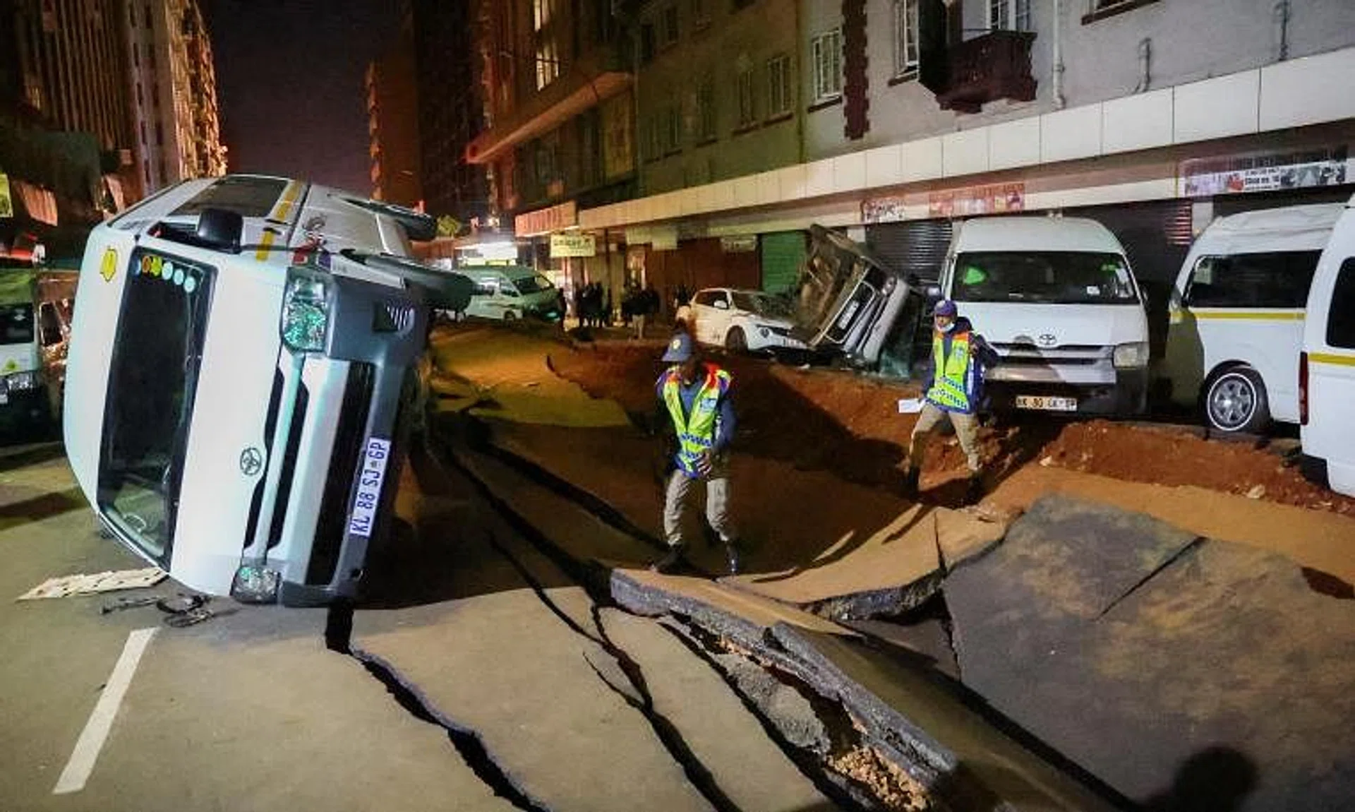 The unexplained rush-hour blast tore through a main road, cracking tarmac and overturning vehicles.