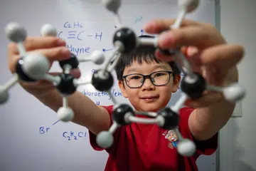 Meet the seven-year-old chemistry whiz kid who attends NTU lectures