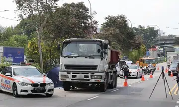 Female pillion rider dies after motorcycle collides with tipper truck in Jurong East