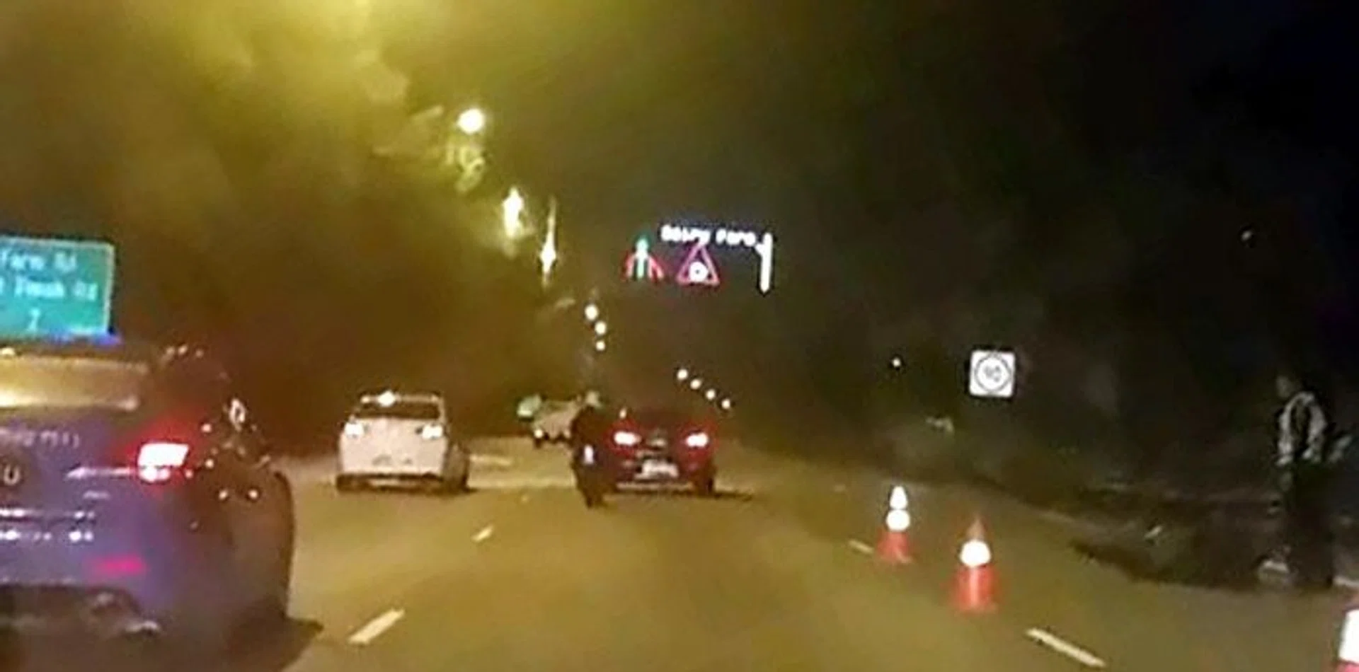 ACCIDENT: The police cordoned off the right side of the Bukit Timah Expressway after the accident.
