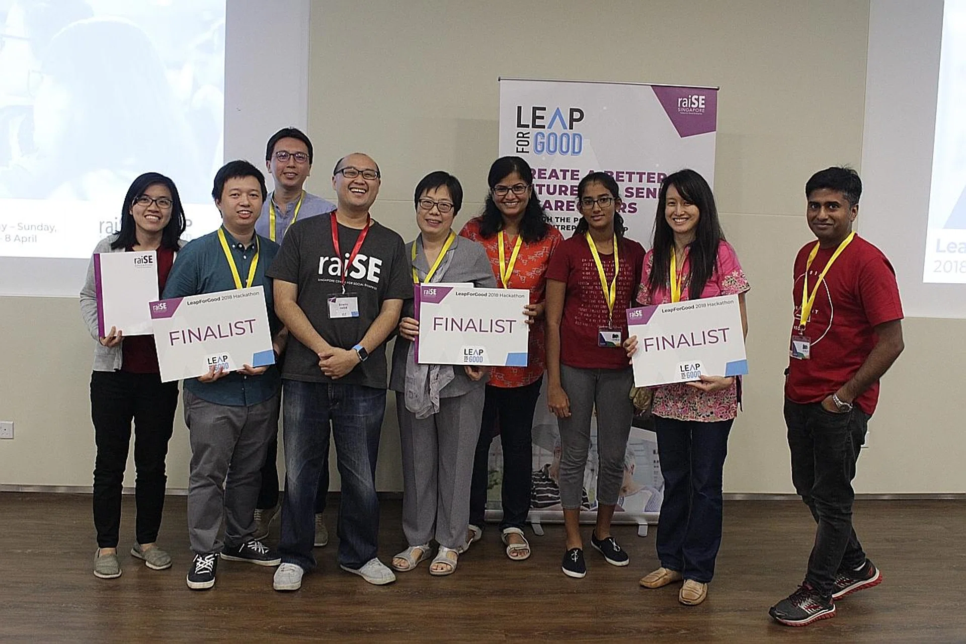 (From left, holding "finalist" boards) Winners Allan Tay, Flora Ng and Isabel Lim will move on to prototype their ideas at Demo Day on Aug 18. 