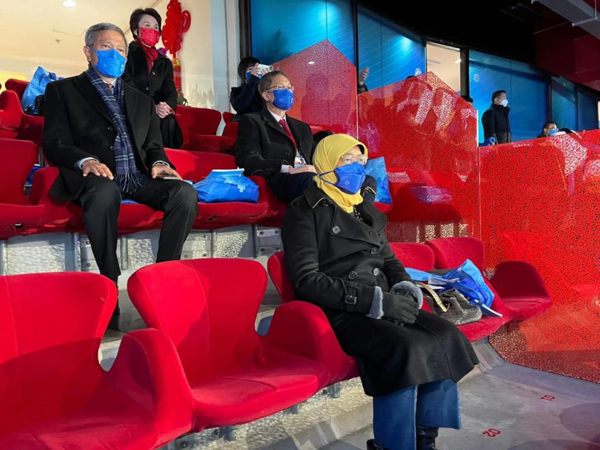 President Halimah Yacob and Foreign Minister Vivian Balakrishnan (top left) watching the opening ceremony in Beijing yesterday. She is among 30 heads of state, governments and international organisations who attended the event, including Russian President Vladimir Putin and Pakistan Prime Minister Imran Khan.