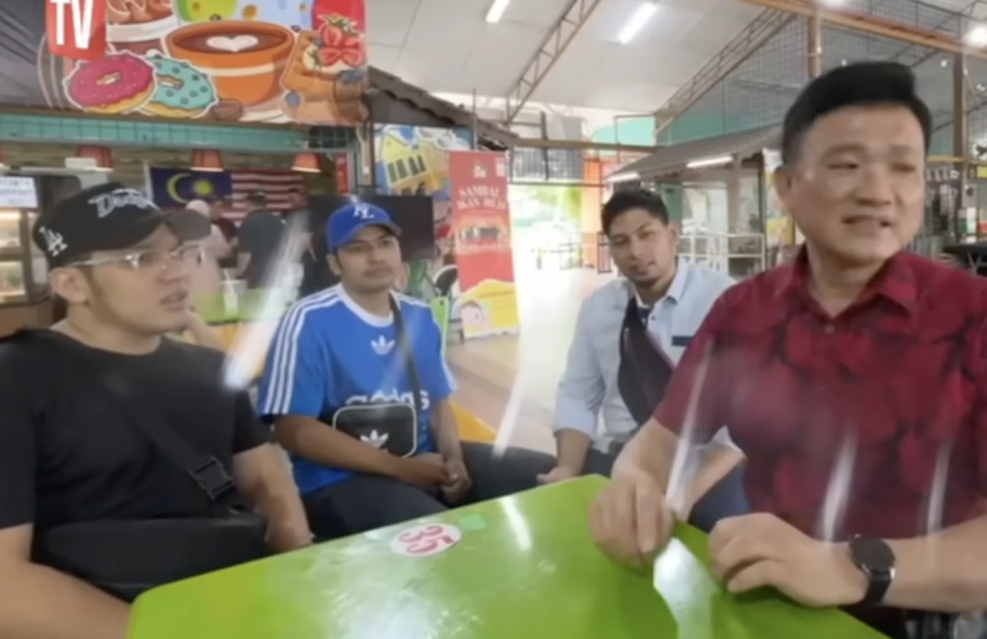 Mr Michael Tong and his foster children.