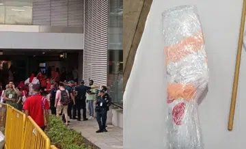 Man with concealed cleaver arrested at National Day event