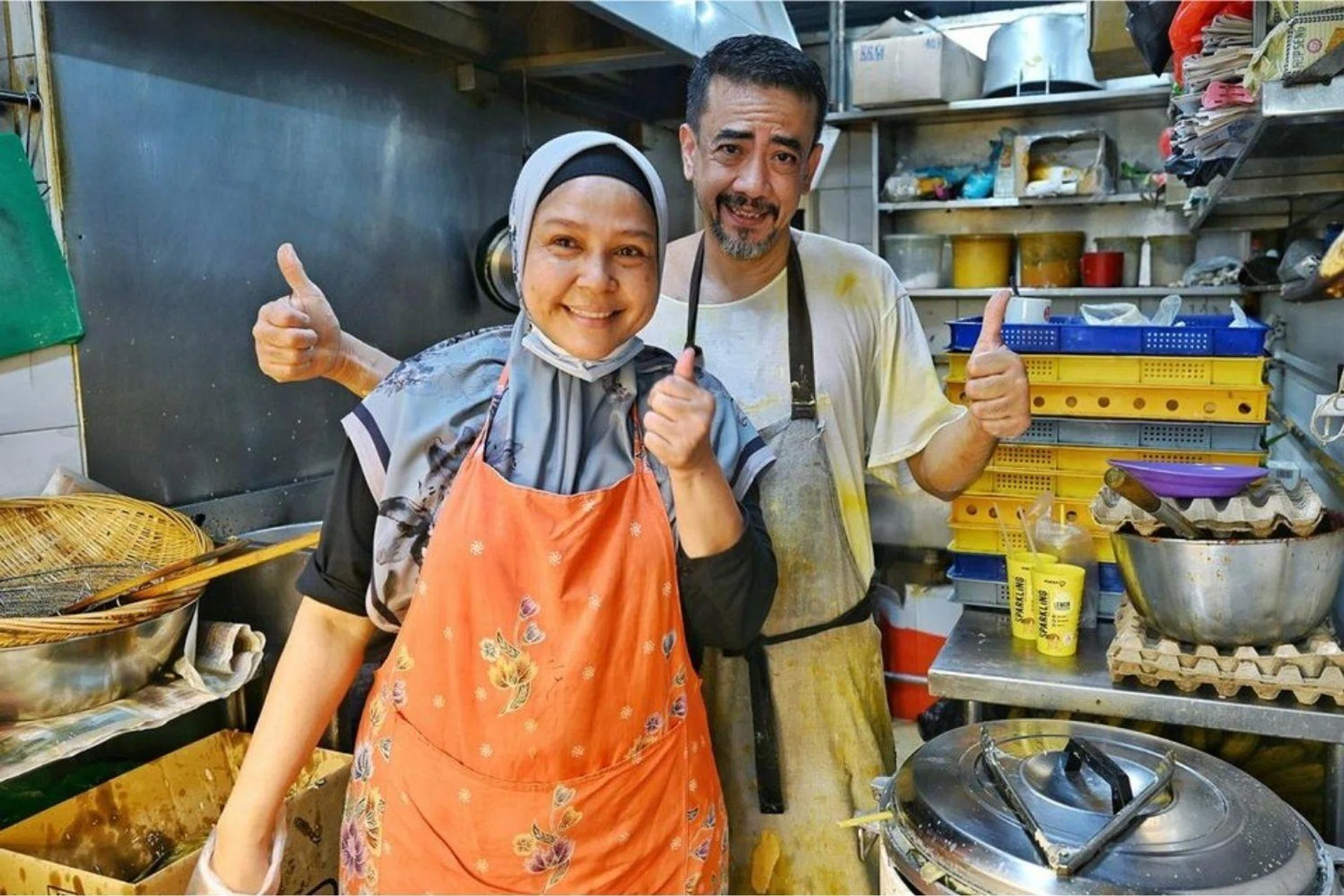 Instead of a kebaya, Ms Masita now dons an apron to serve her customers at Serangoon Gardens.