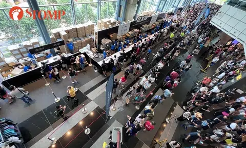 Runners queue for up to 3½ hours for race pack at Suntec, organiser apologises