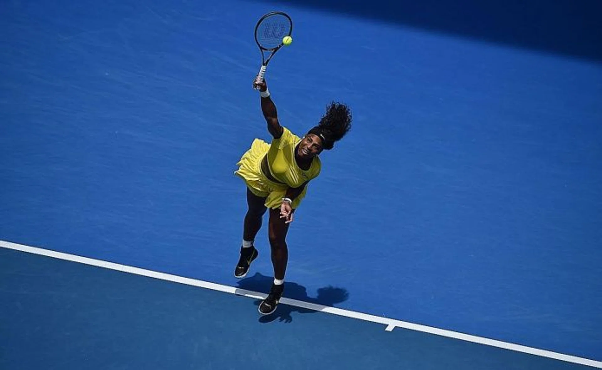 BOOM: Maria Sharapova has no answer to Serena Williams' (above) raw power in yesterday's quarter-final match.