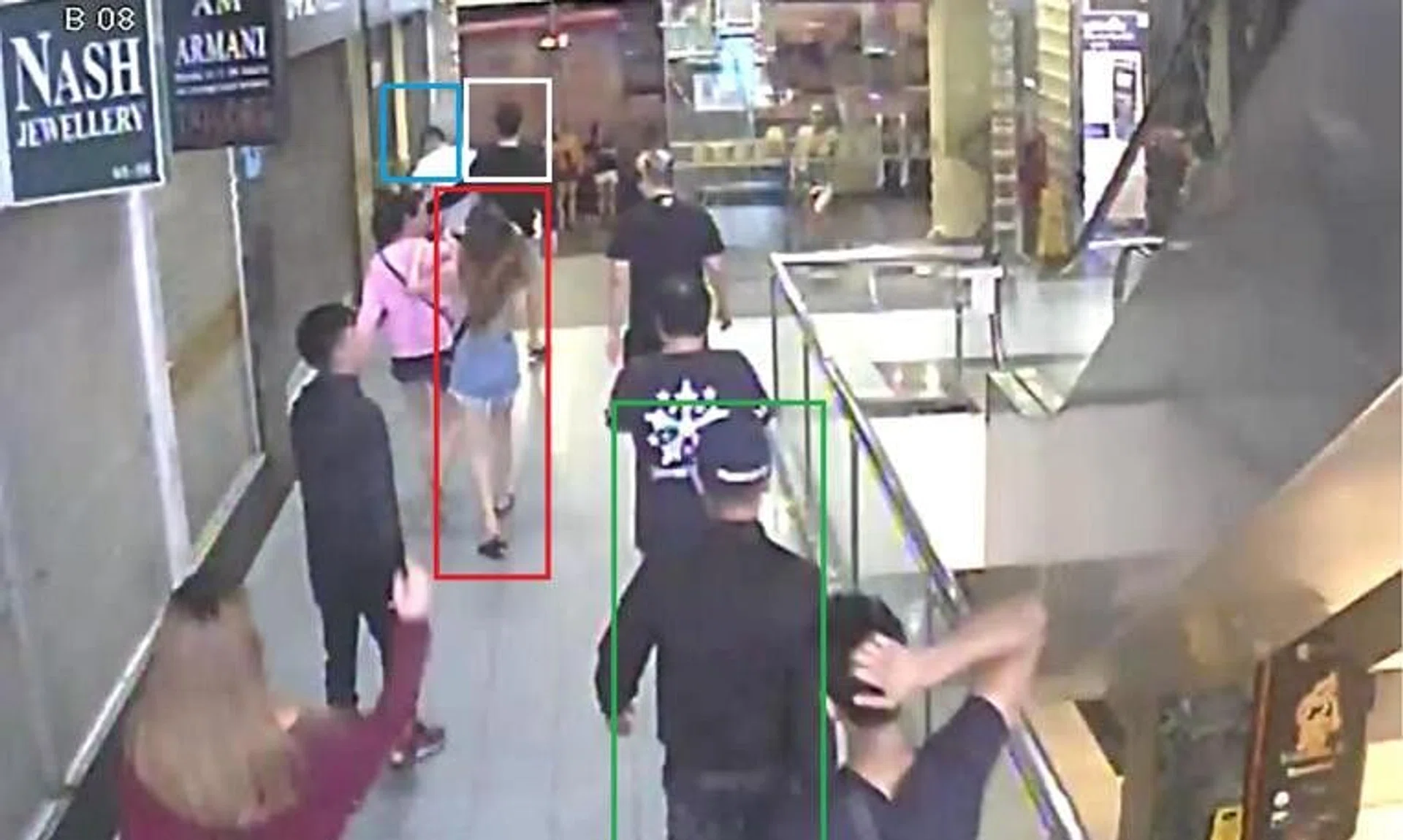 Tan Sen Yang (in white) was seen on surveillance footage punching Mr Satheesh Noel Gobidass repeatedly.