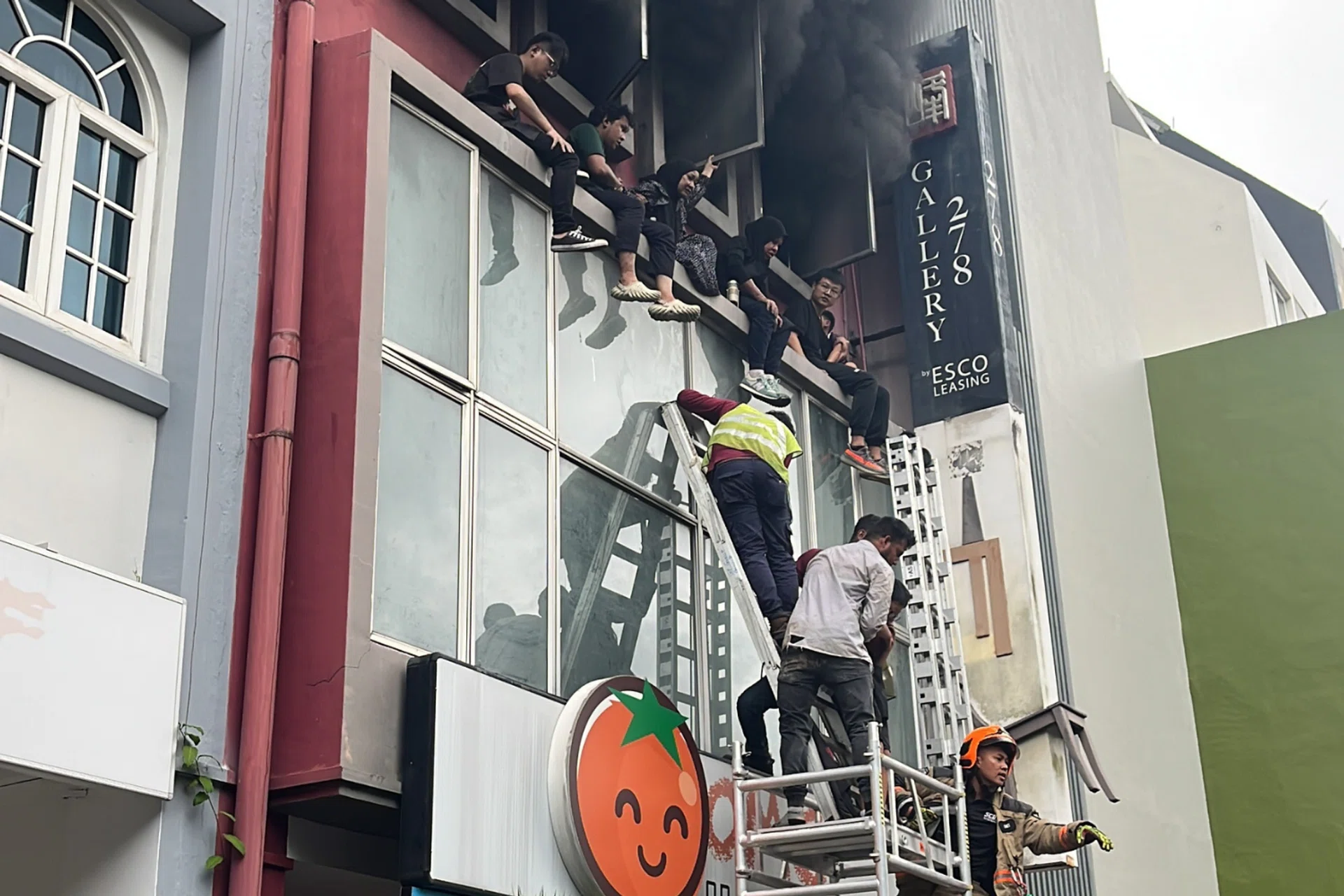 Construction workers assisted the victims in evacuating before the SCDF arrived. 
