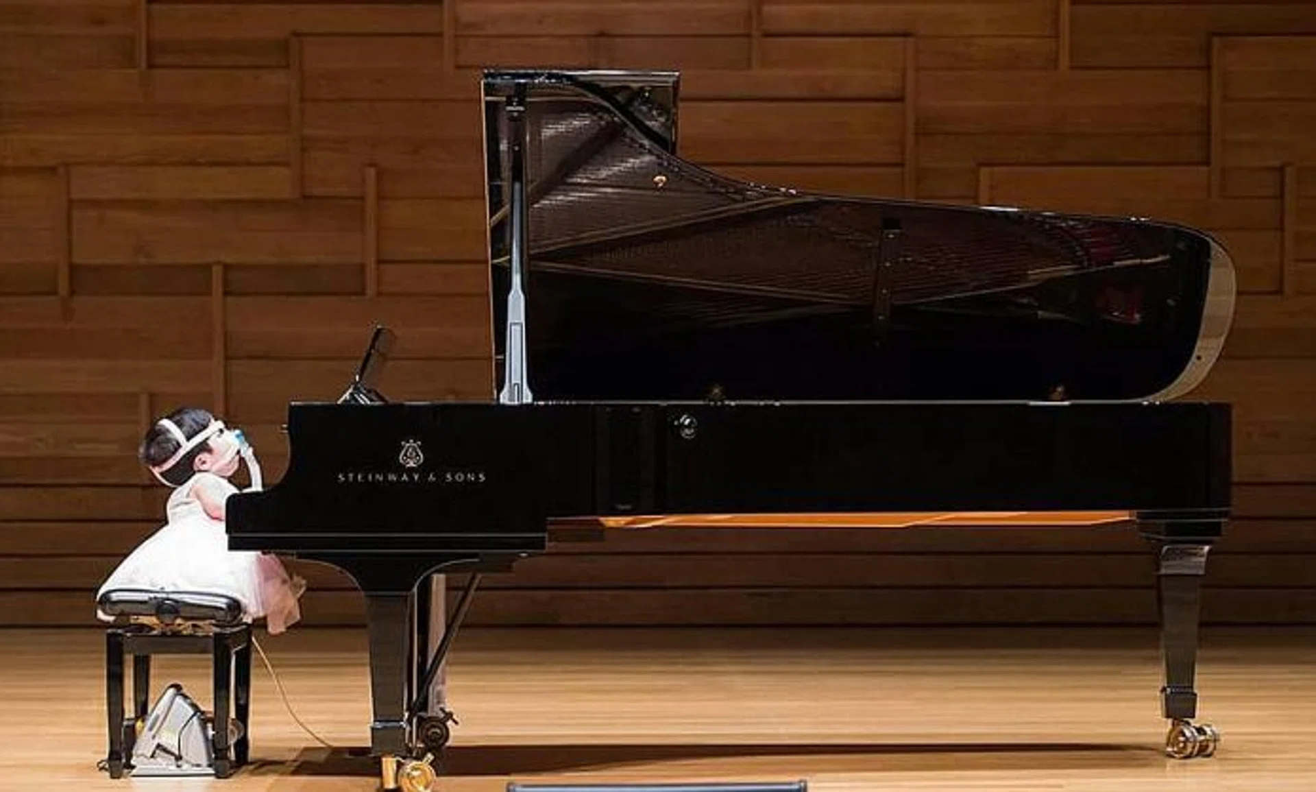 RESILIENT: Pei Shan realised her dream of performing in front of a crowd when she played in a charity concert at the School Of The Arts in April 2014.