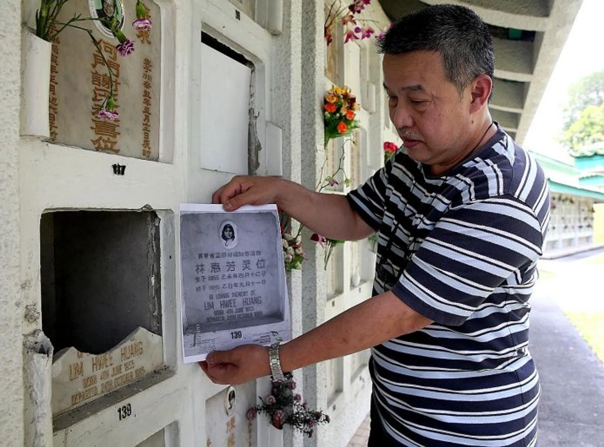EMPTY:  Mr Tommy Lim and his mother found his sister's niche broken into and the urn with her ashes gone when they went to pay their respects for the Qing Ming Festival.