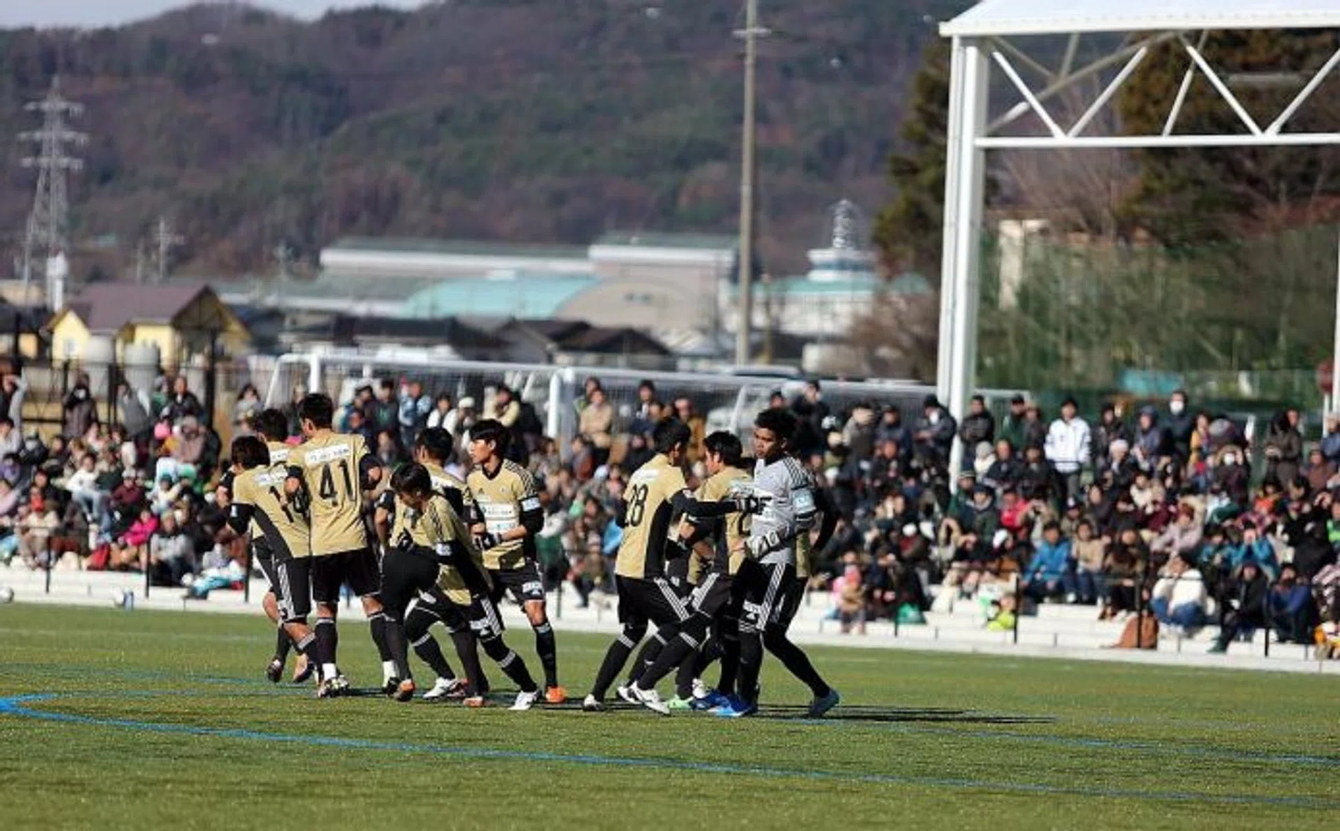 ON TRIAL: Singapore goalkeeper Izwan Mahbud (far right) turning out for Matsumoto Yamaga in a friendly against Matsumoto University last December.