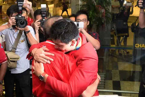 A hug meant so much to Colin and Joseph Schooling
